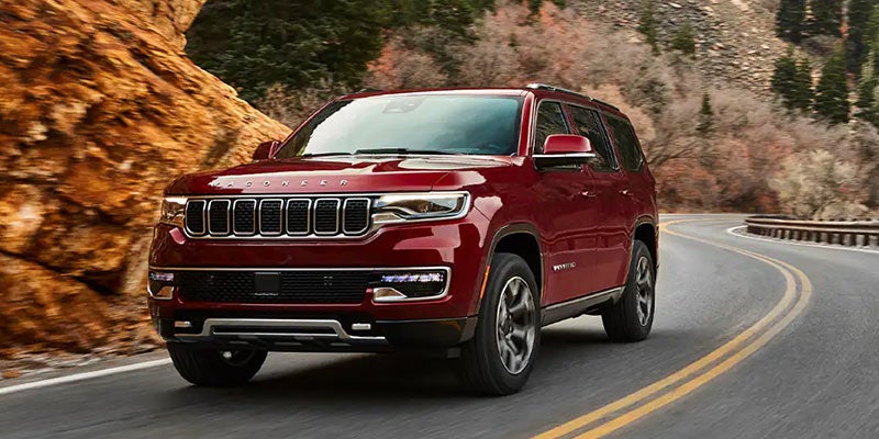 red 2022 wagoneer on the road