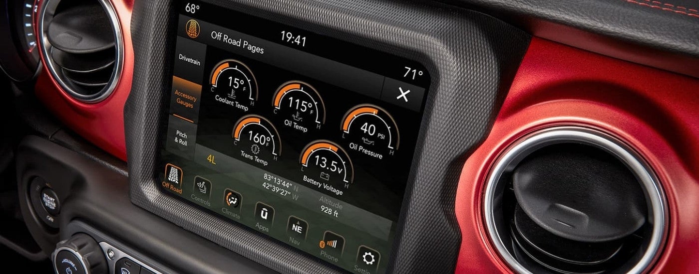 The infotainment screen is shown in a 2023 Jeep Wrangler for sale.