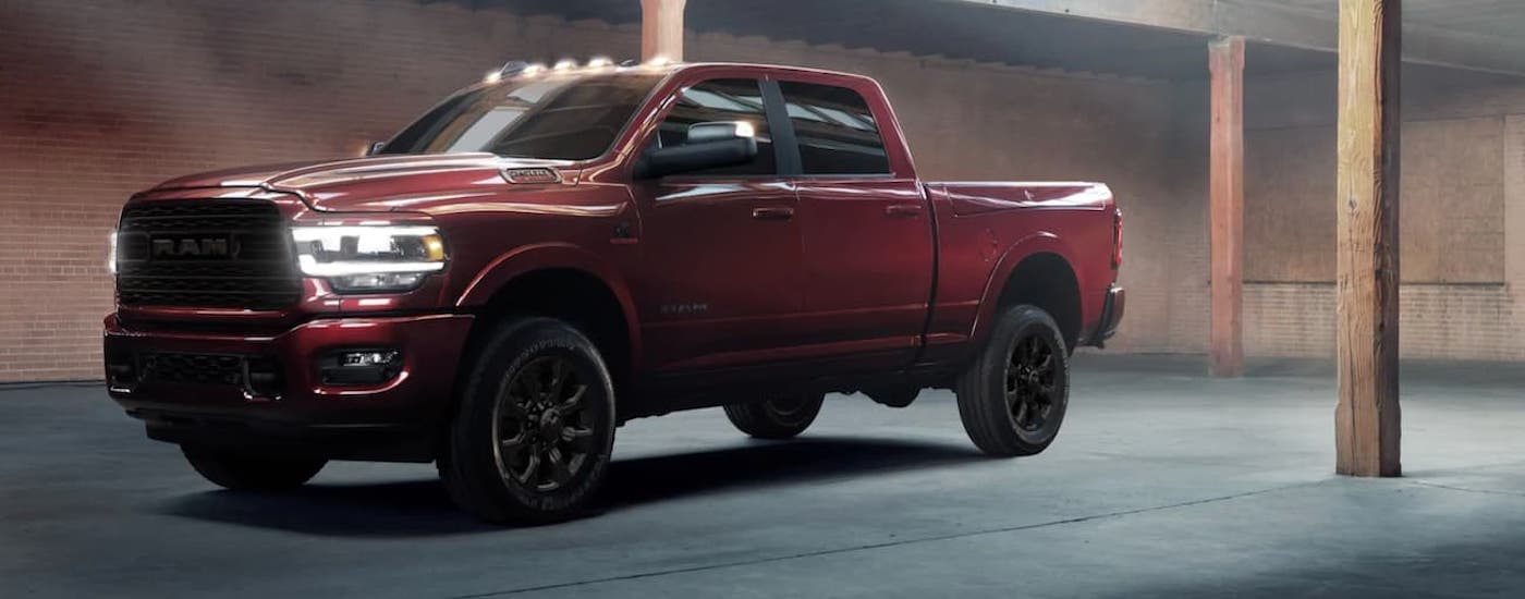 A red 2021 Ram 2500 parked in a parking garage after visiting a used Ram dealer.